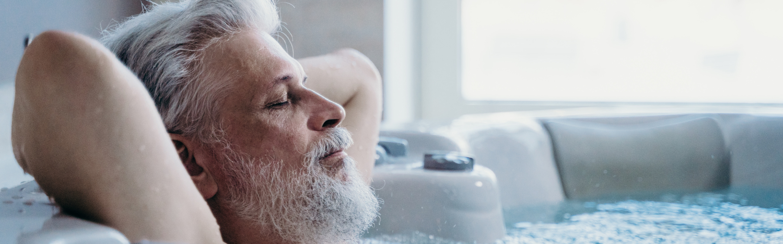 How does a hot tub help with headaches?